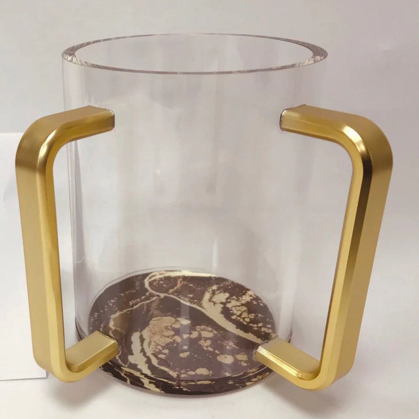 Lucite washing cup with marble bottom and gold handles on a white background - AFH Bargains