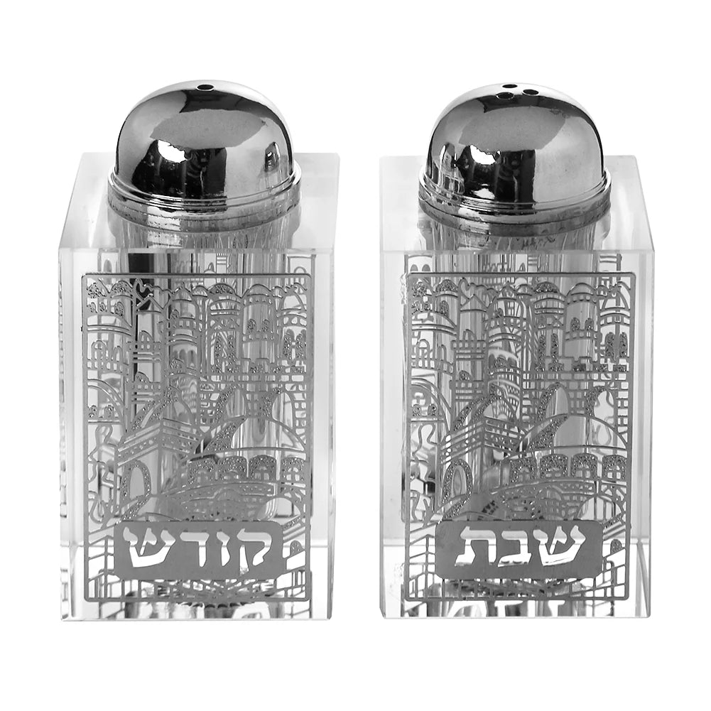 Two salt and pepper shakers with intricate designs and Hebrew text on a white background - AFH Bargains