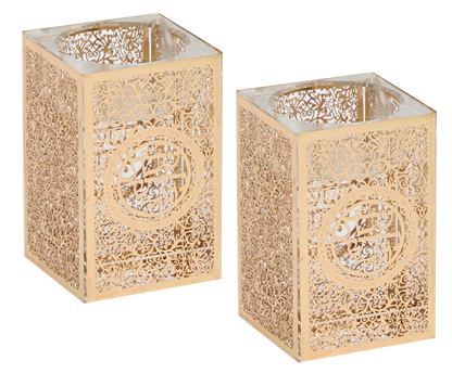 Two gold decorative candle holders with intricate patterns on a white background - AFH Bargains