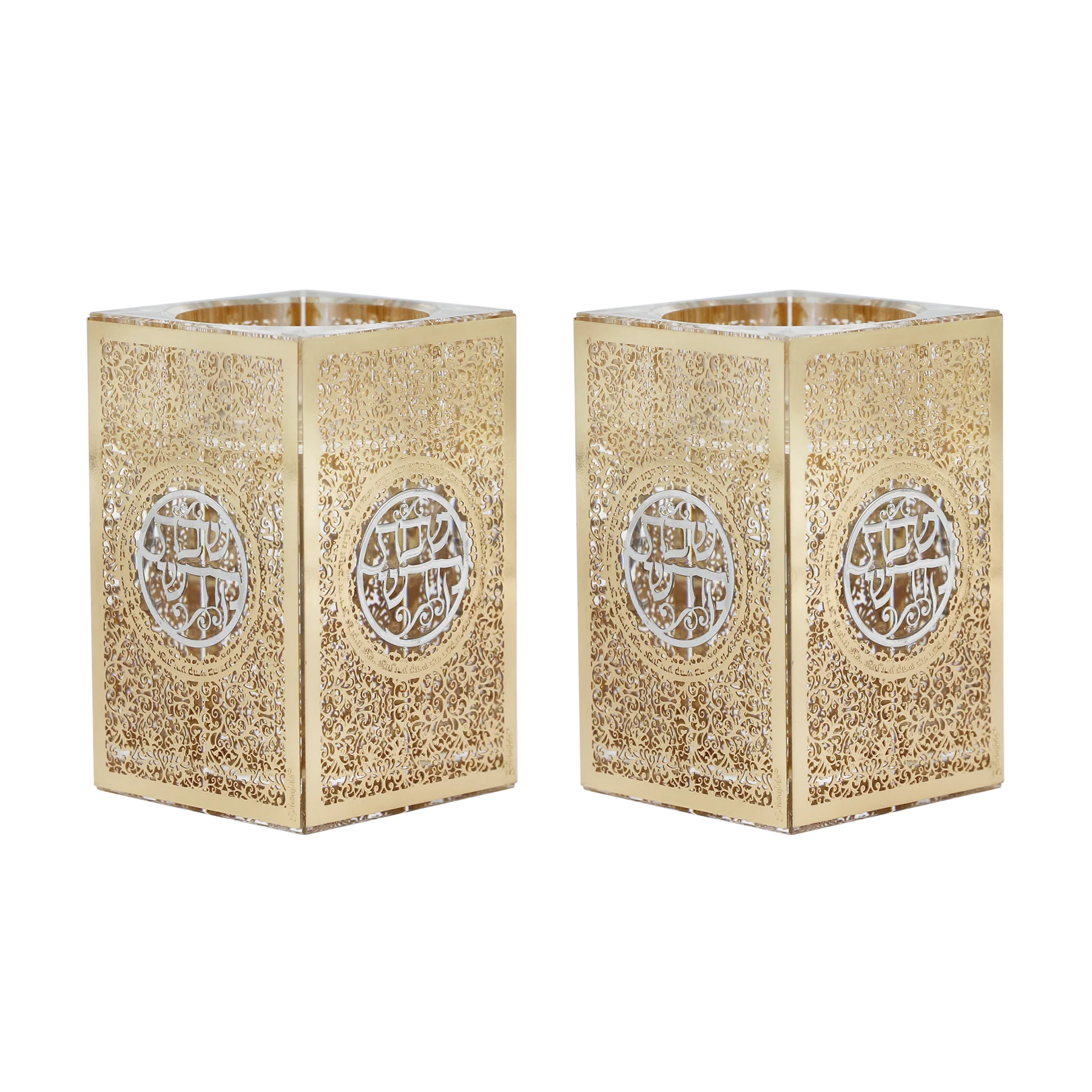 Two gold decorative candle holders with intricate patterns on a white background - AFH bargains