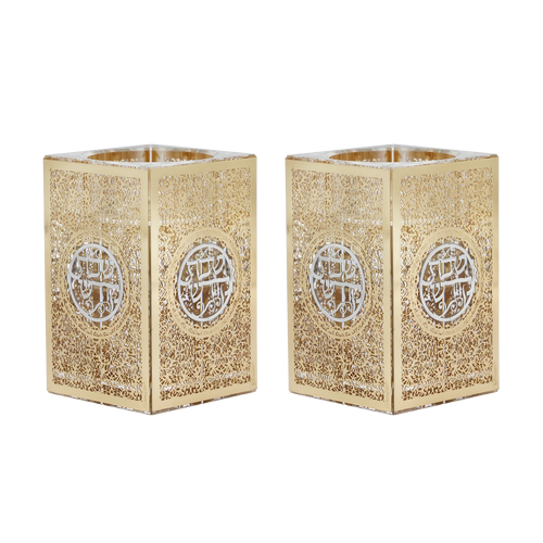 Two gold decorative candle holders with intricate patterns on a white background - AFH bargains