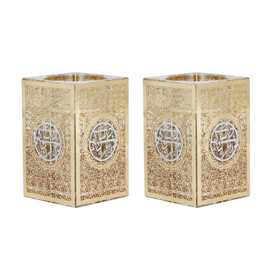 Two gold decorative candle holders with intricate patterns on a white background - AFH bargains