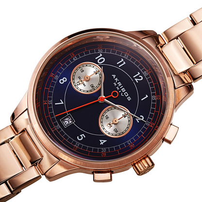 Akribos XXIV Ion Plated Rose Gold Tone Case Chronograph Watch with Rose Gold Tone Link Bracelet and Blue Dial