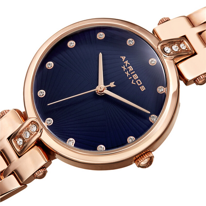 Akribos XXIV Ion Plated Rose Gold Tone Case, Blue Dial with Swarovski Crystal Markers, on a Rose Gold Tone Link Bracelet