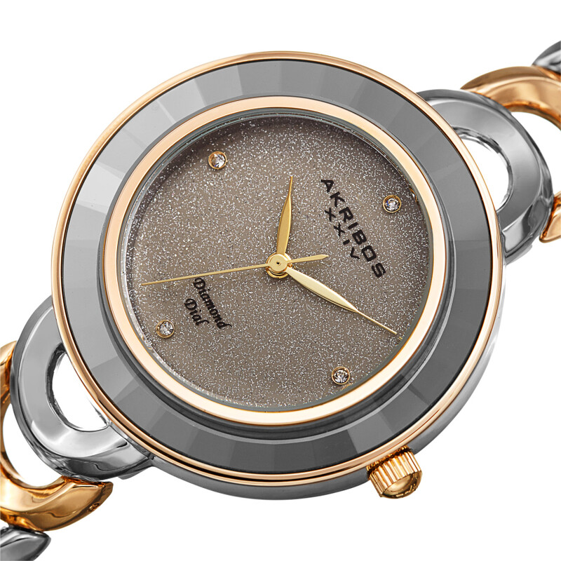 Akribos XXIV Ion Plated Two Tone Silver and Gold Watch with Grey Faceted Crystal on the Case, Silver Glitter Dial and Diamond Markers