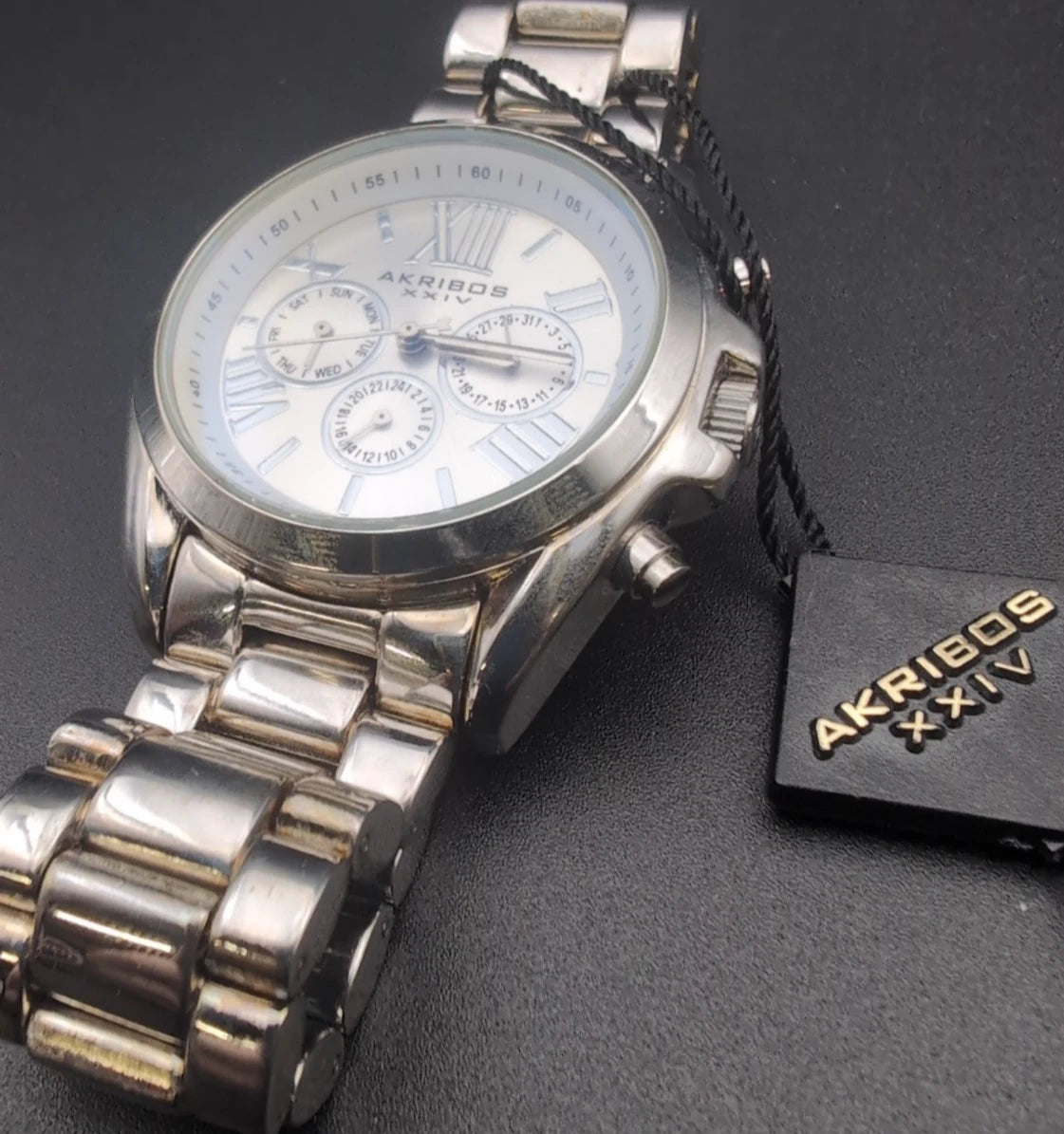 Akribos XXIV Silver Flashed Alloy Case on Silver Bracelet, Silver Dial with Silver Tone Hands