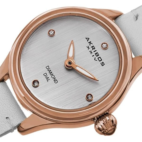 Akribos XXIV Rose Gold Ion Plated Alloy Case on White Strap, Silver Dial with Rose Gold Tone Hands