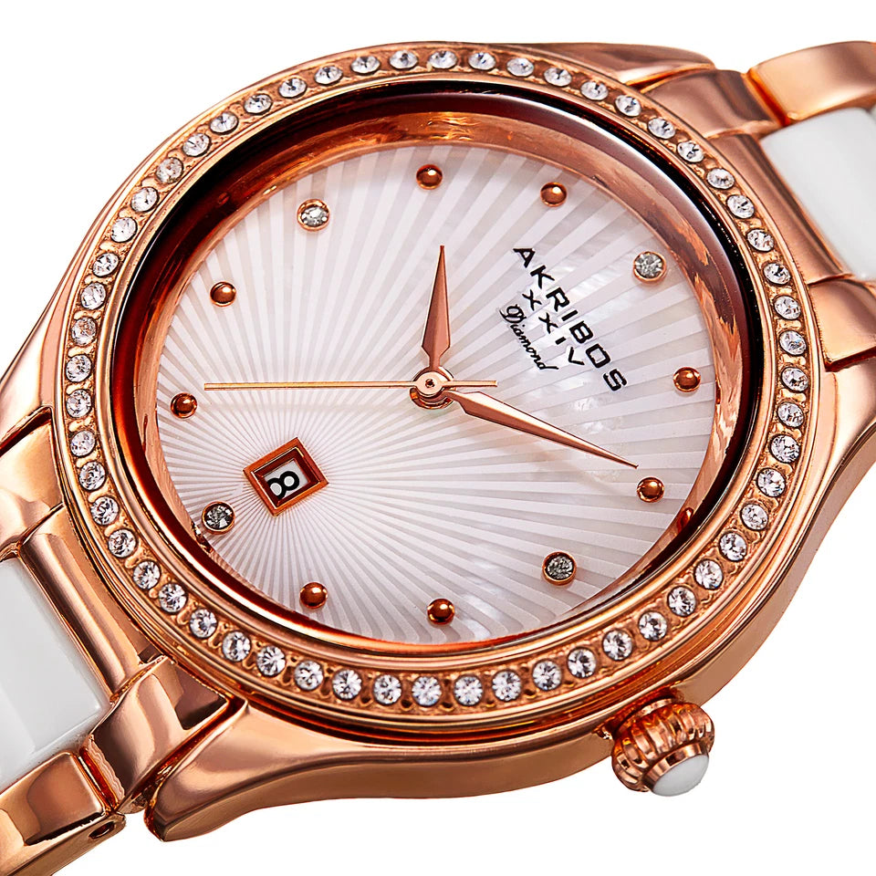 Akribos XXIV Rose Gold Ion Plated Round Watch With a Swarovski Crystal Bezel on a Rose Gold Link and White Ceramic Link Bracelet