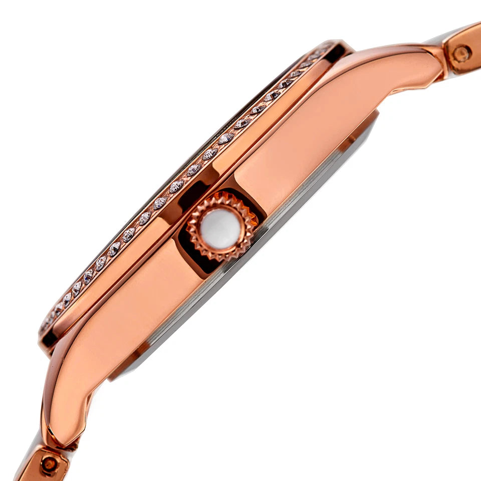 Akribos XXIV Rose Gold Ion Plated Round Watch With a Swarovski Crystal Bezel on a Rose Gold Link and White Ceramic Link Bracelet